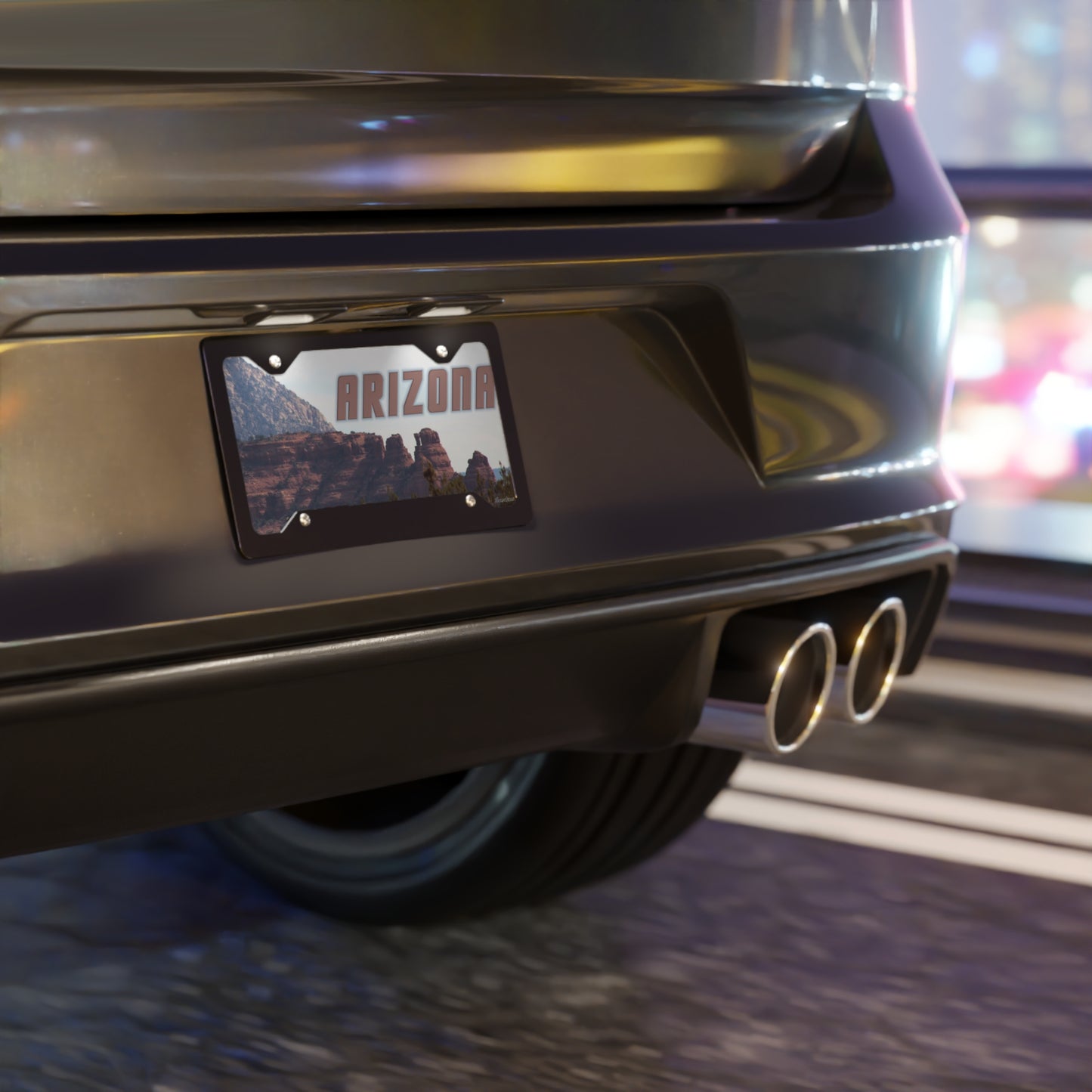 Close-up of an Arizona vanity plate mounted on a sleek car bumper for personalized vehicle styling