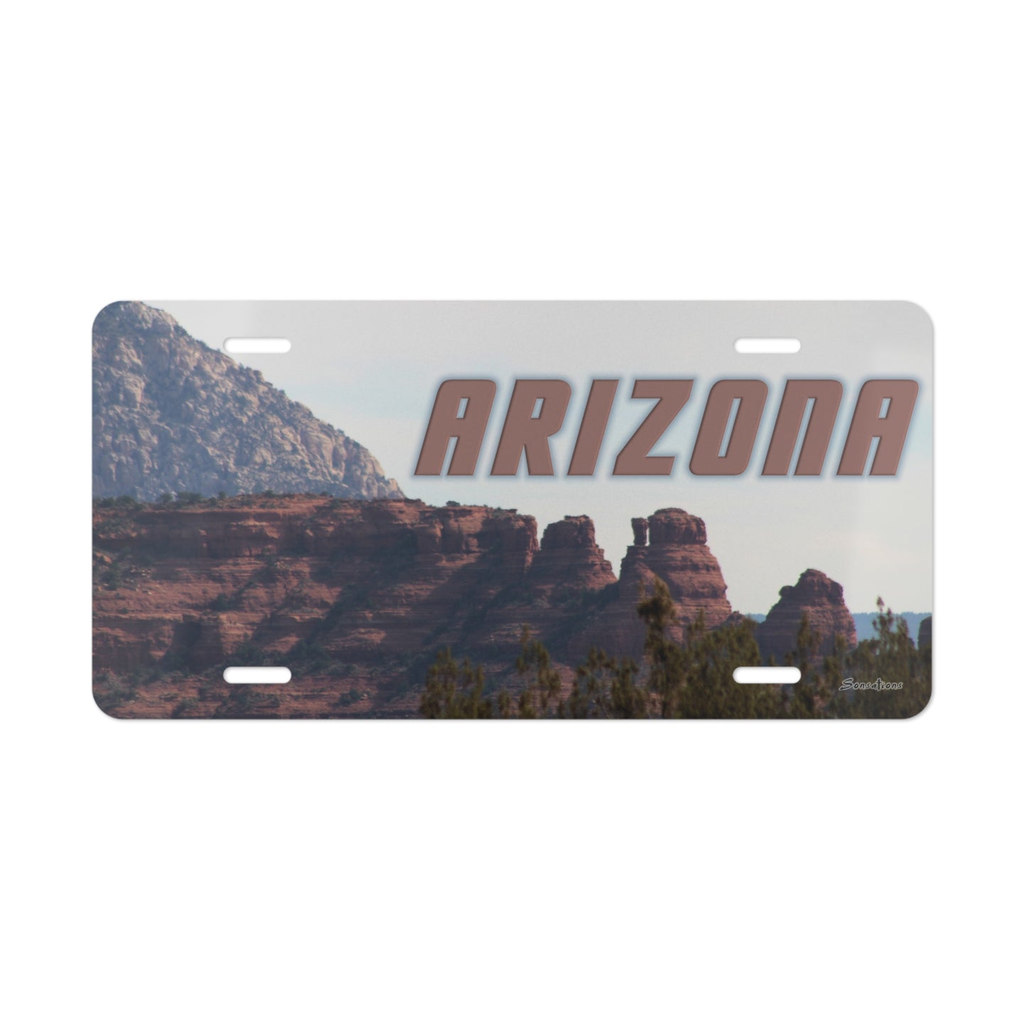 Arizona vanity plate featuring a scenic view of red rock formations and mountains