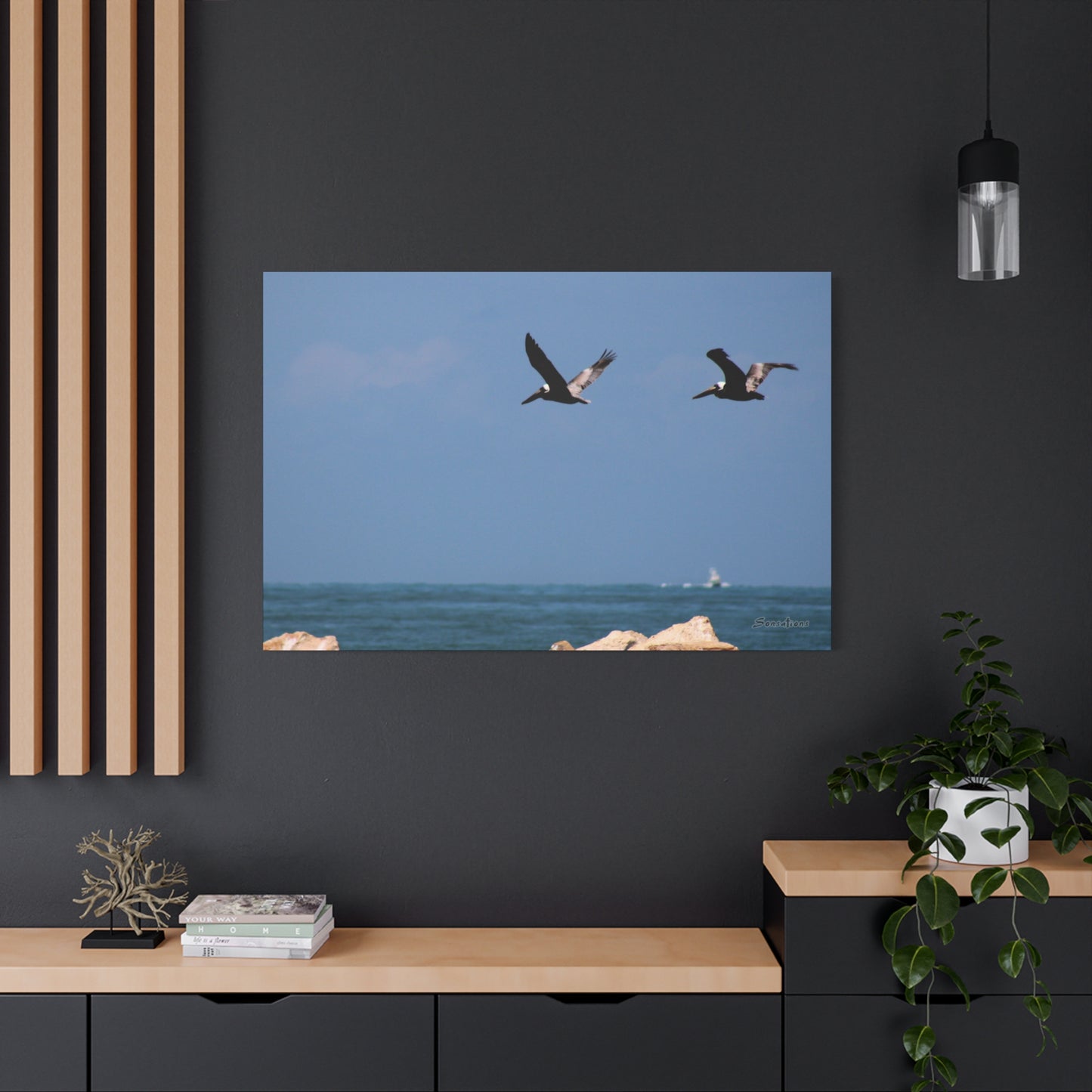Coastal bird wall art featuring birds in flight against a serene ocean background