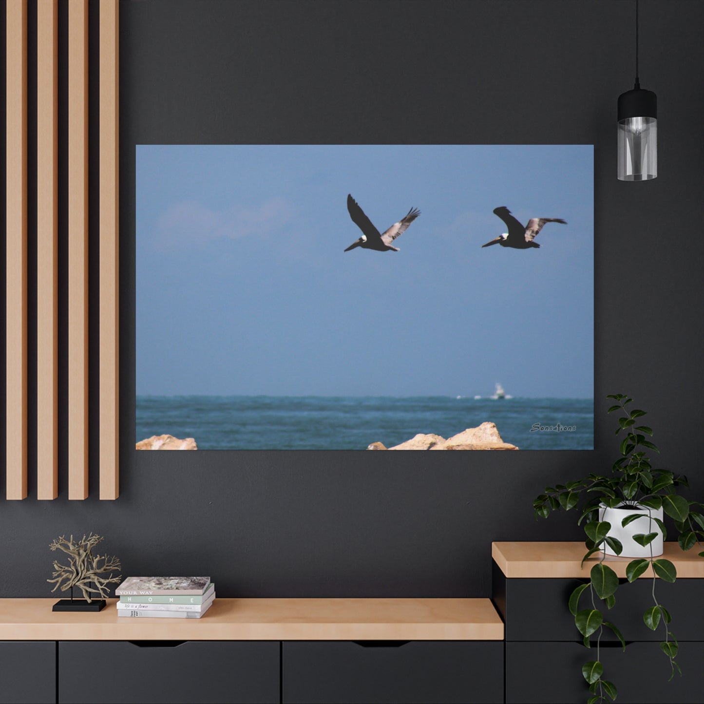 Coastal bird wall art featuring two birds soaring over the ocean in a serene landscape