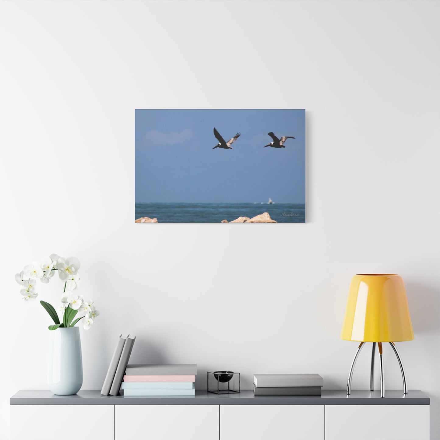 Coastal bird wall art featuring flying birds over a blue ocean backdrop for decorative home accents