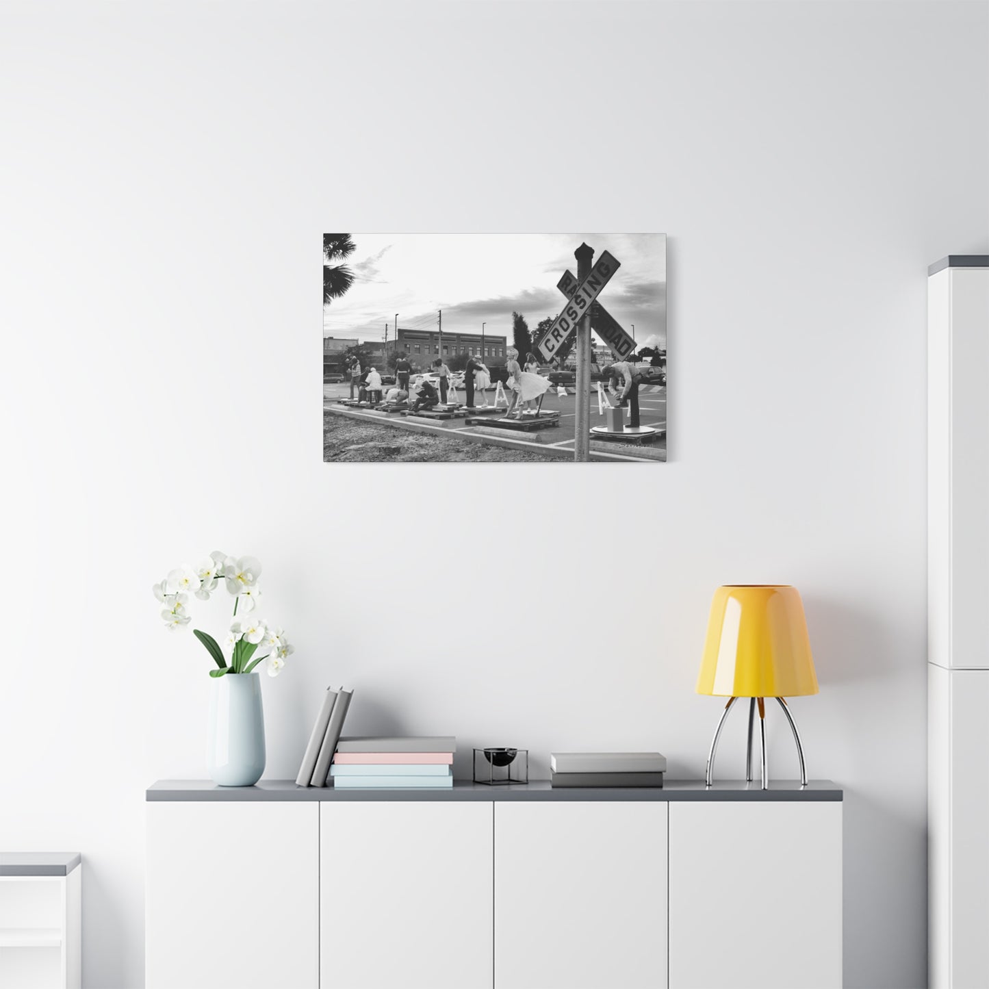 Black and white Marilyn Monroe canvas art displayed in a modern living room setting