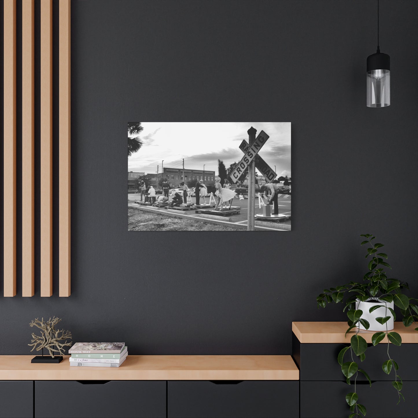 Marilyn Monroe canvas art displayed on a modern wall above a stylish wooden console table