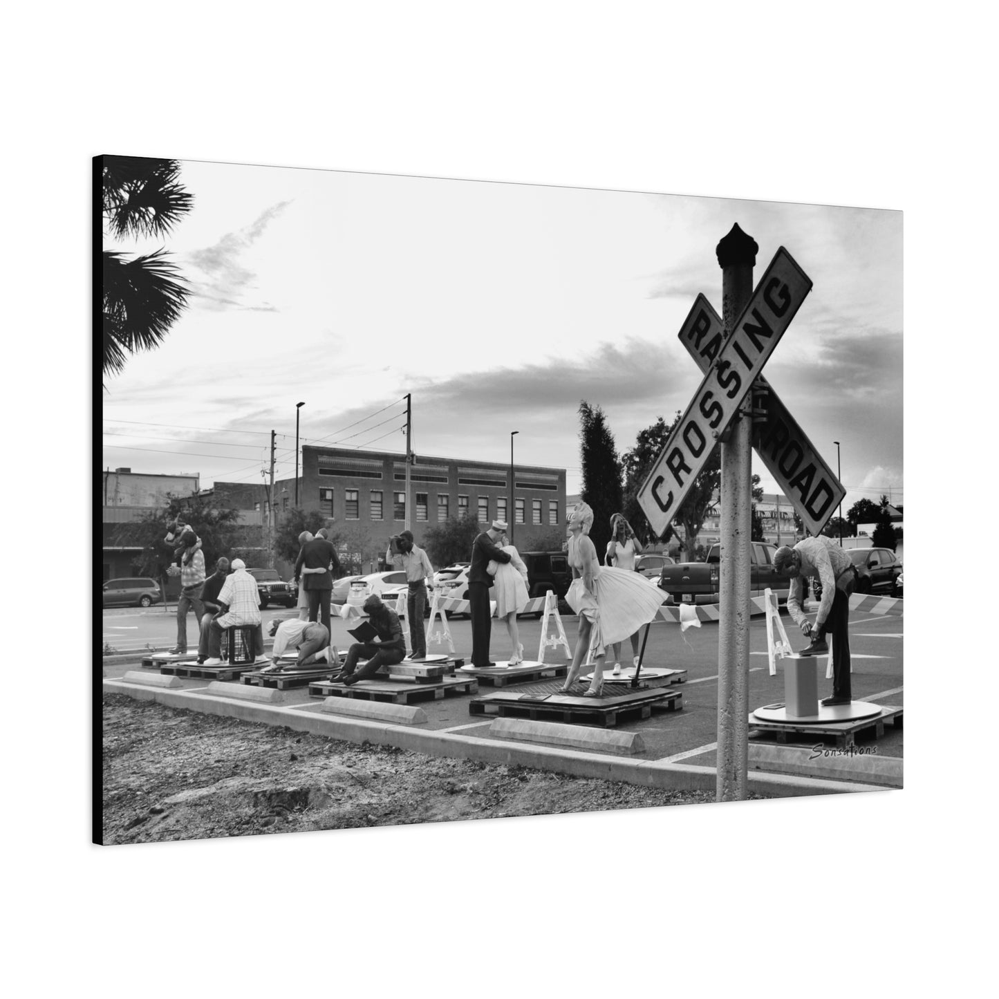 Marilyn Monroe canvas art featuring a vintage scene with models on a street set posing for a photo shoot