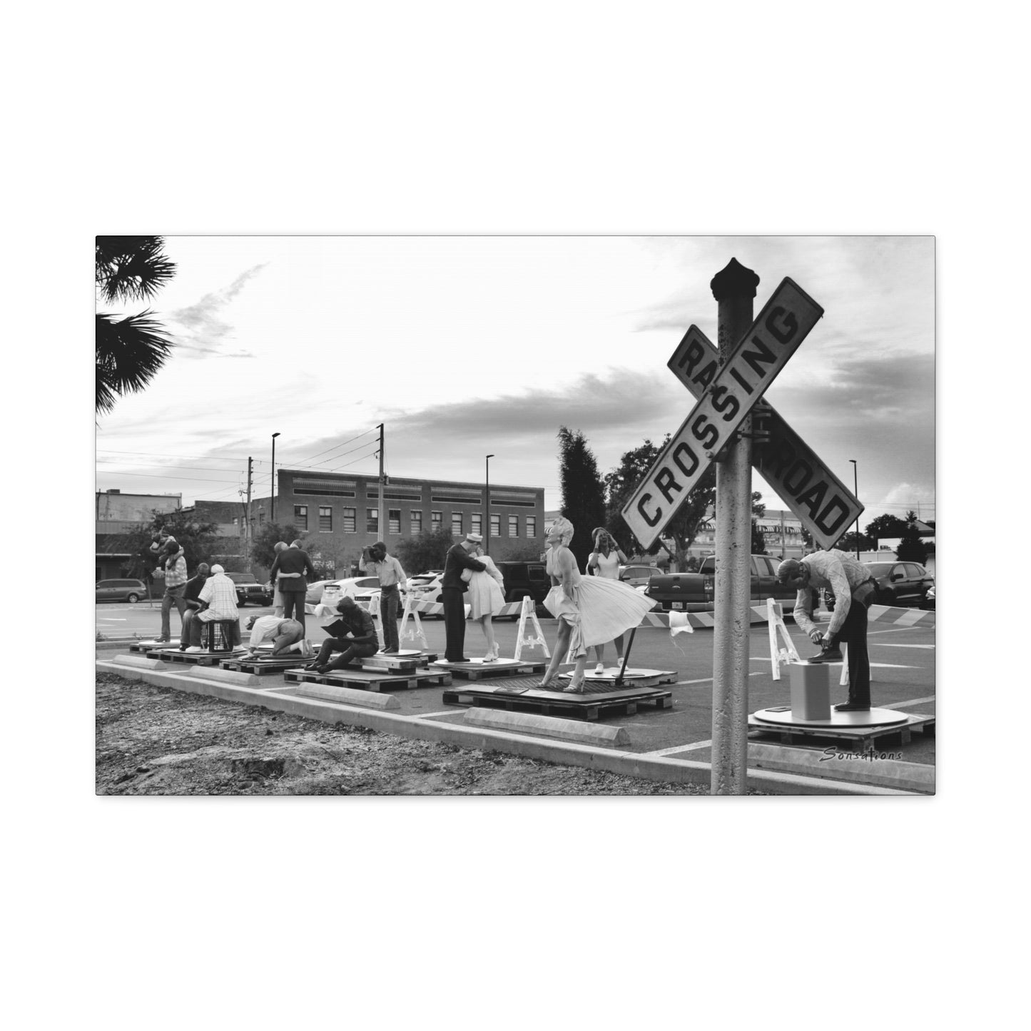 Marilyn Monroe canvas art featuring iconic scene with models at a railroad crossing