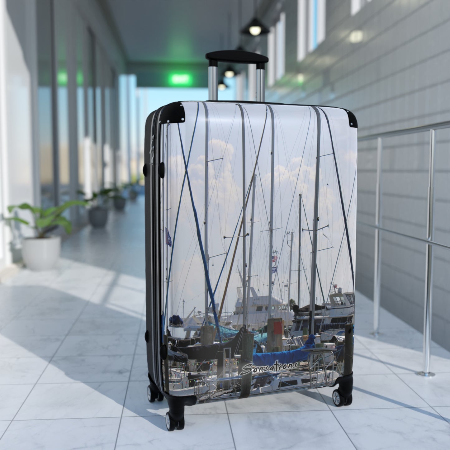 Nautical design suitcase travel luggage featuring a scenic marina print for stylish travelers