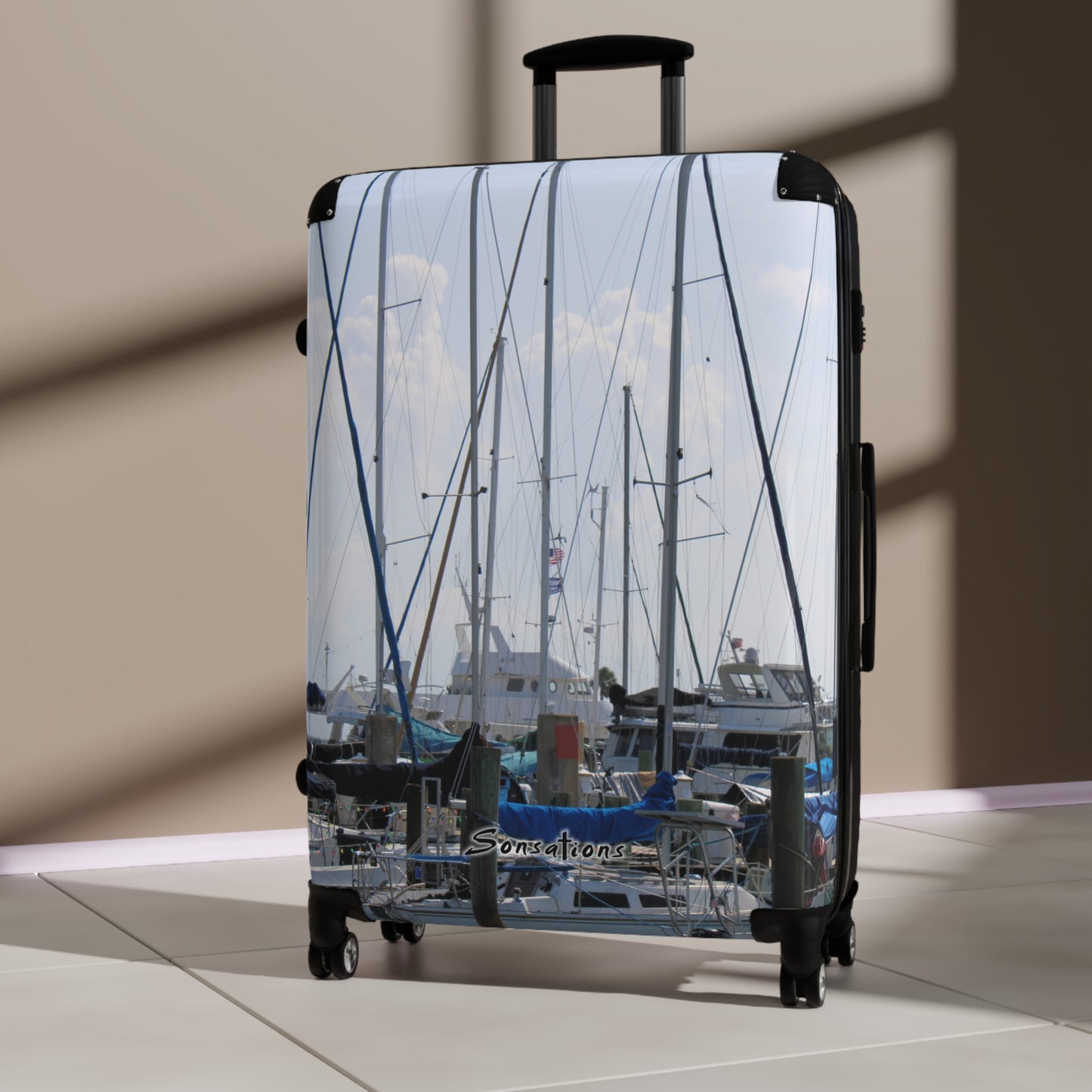 Nautical design suitcase travel luggage featuring a serene marina scene with sailboats
