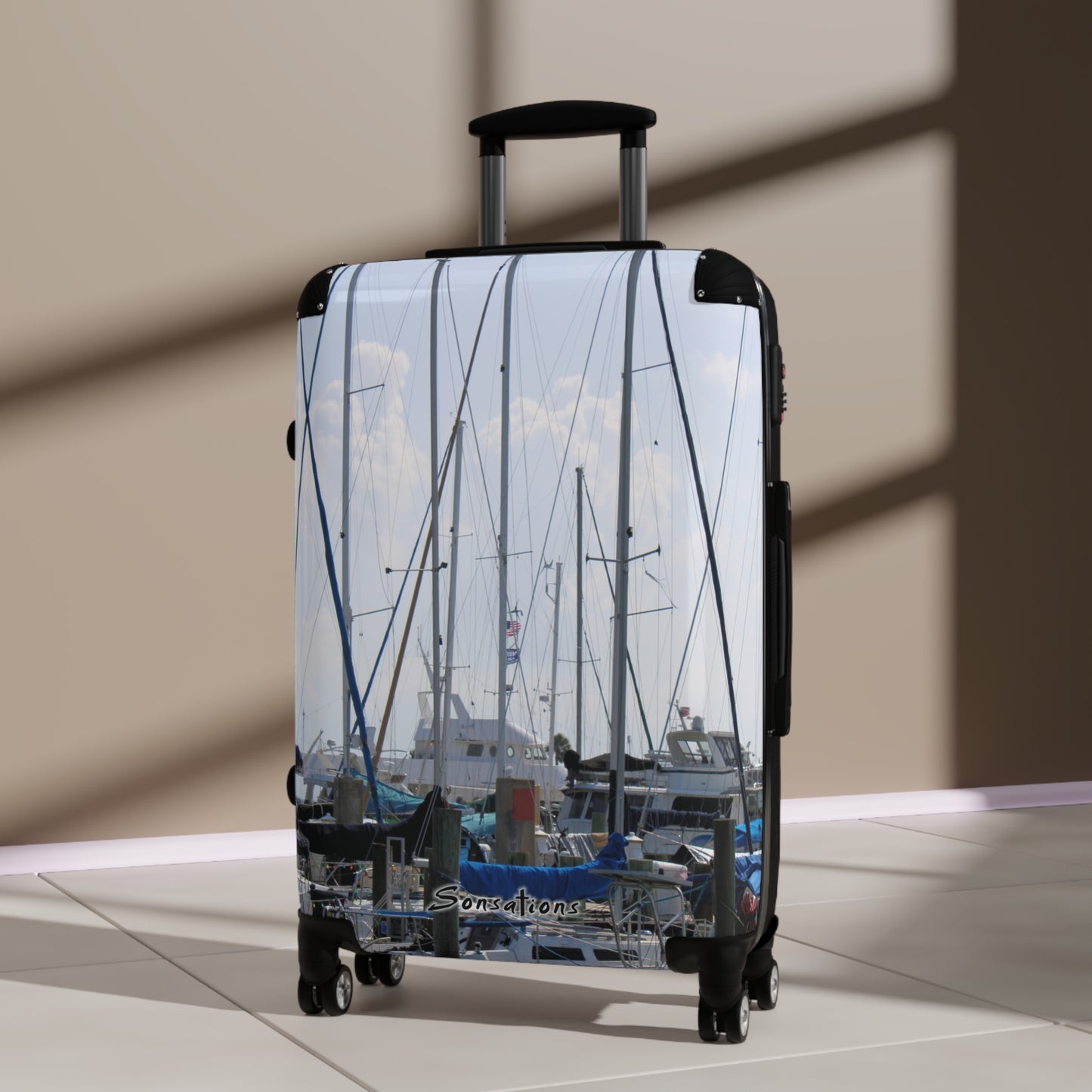 Nautical design suitcase travel luggage featuring a marina scene with boats and masts