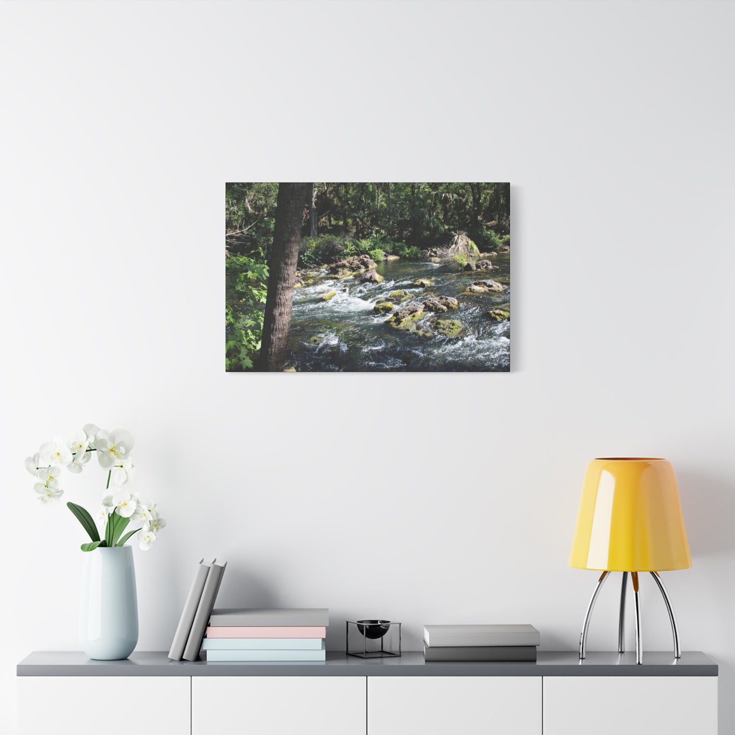 River Rapids Print Gift displayed on wall with modern decor and a vase of flowers