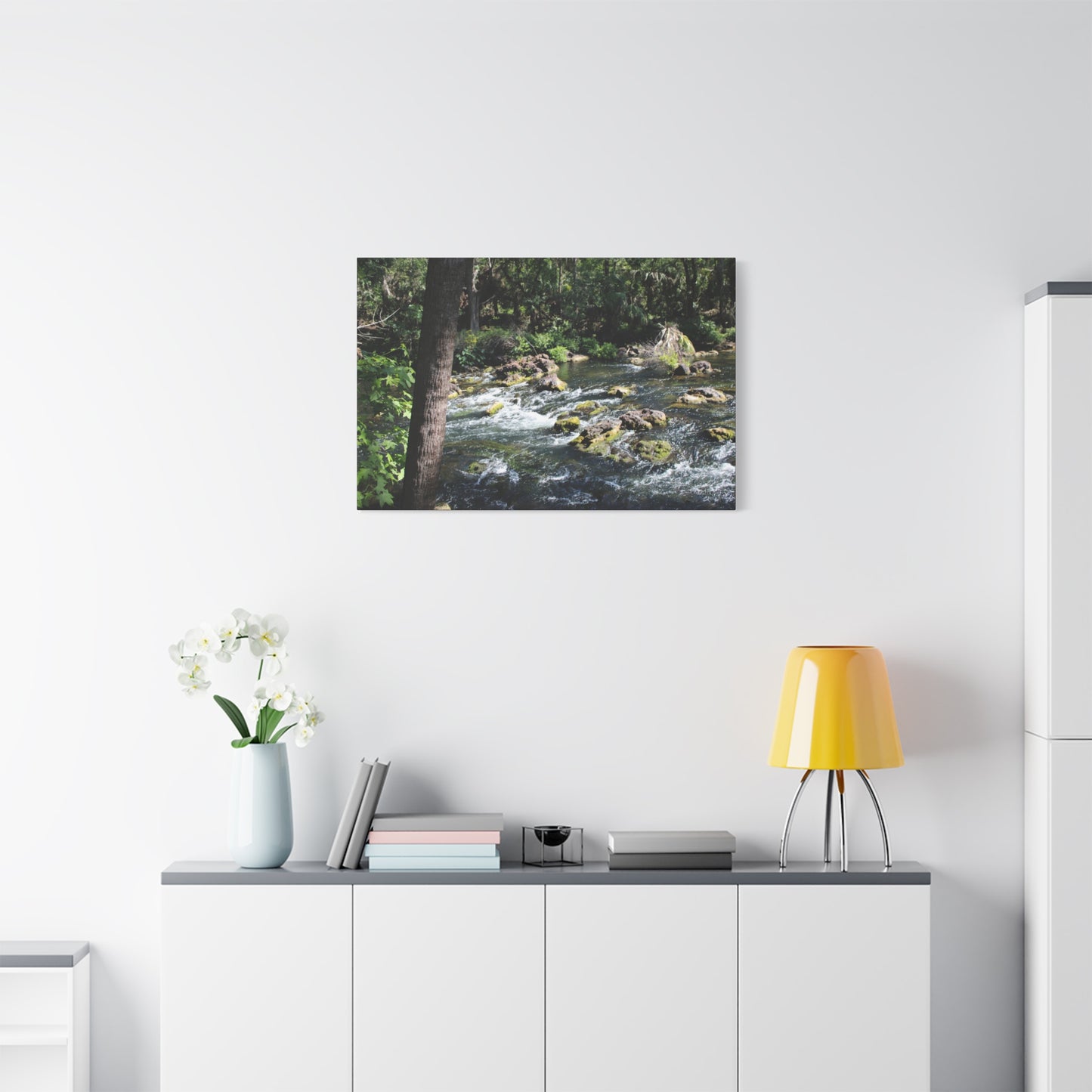 Serene River Rapids Print Gift displayed on a modern wall in a bright room with stylish decor