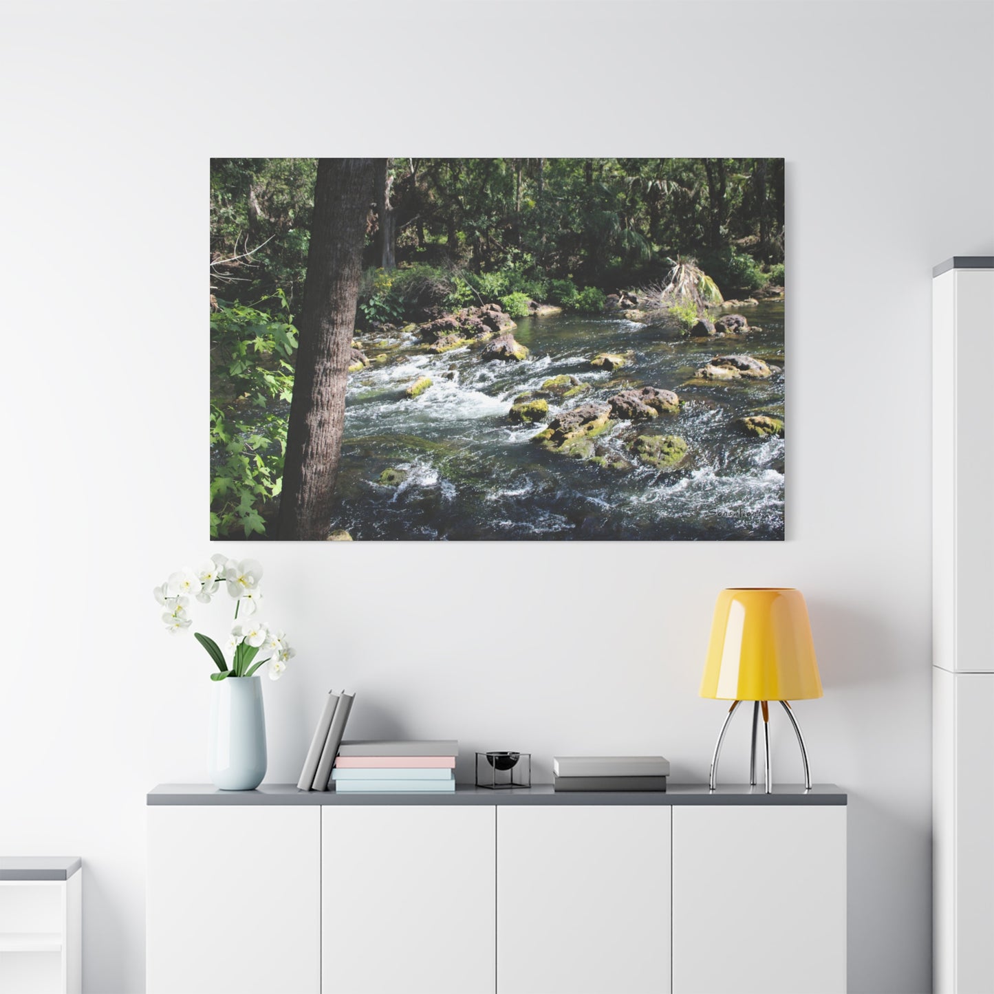 Serene River Rapids Print Gift displayed on a wall with natural scenery and calming water flow