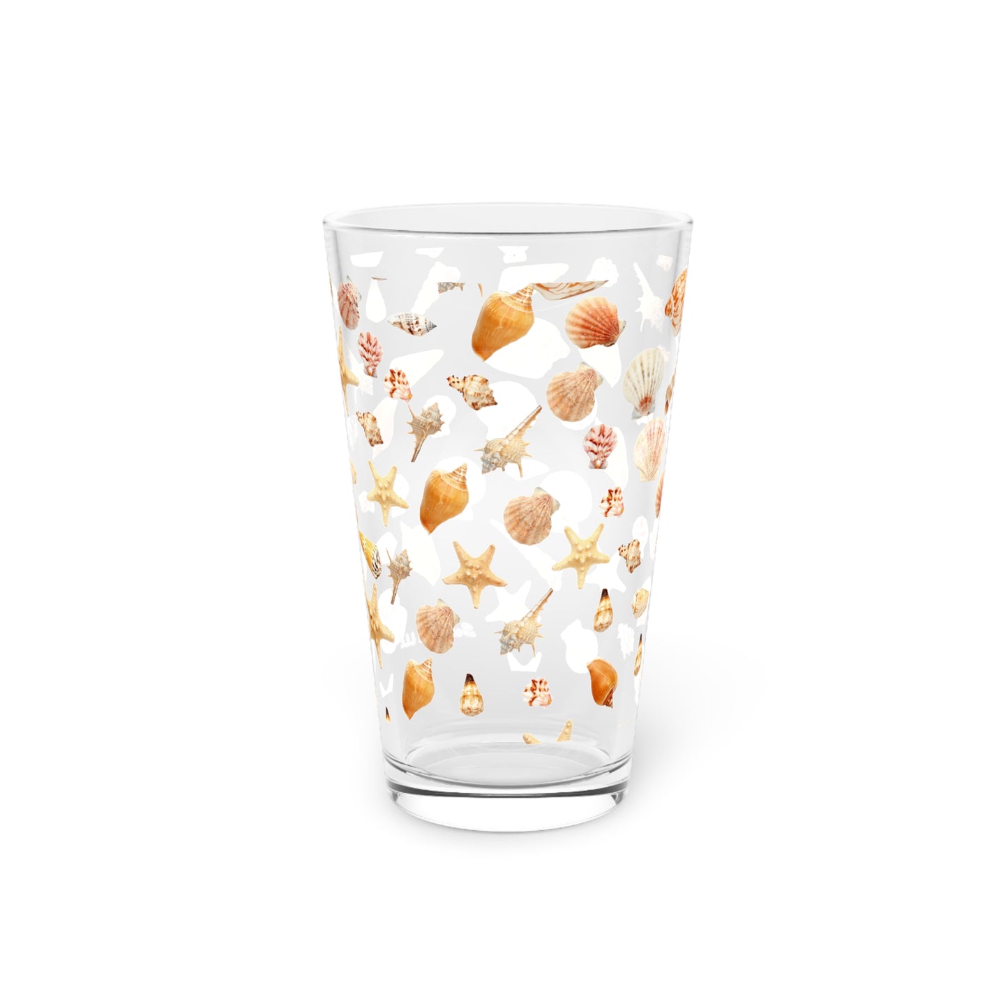 Clear pint glass featuring a seashell design pint glass with colorful shell patterns