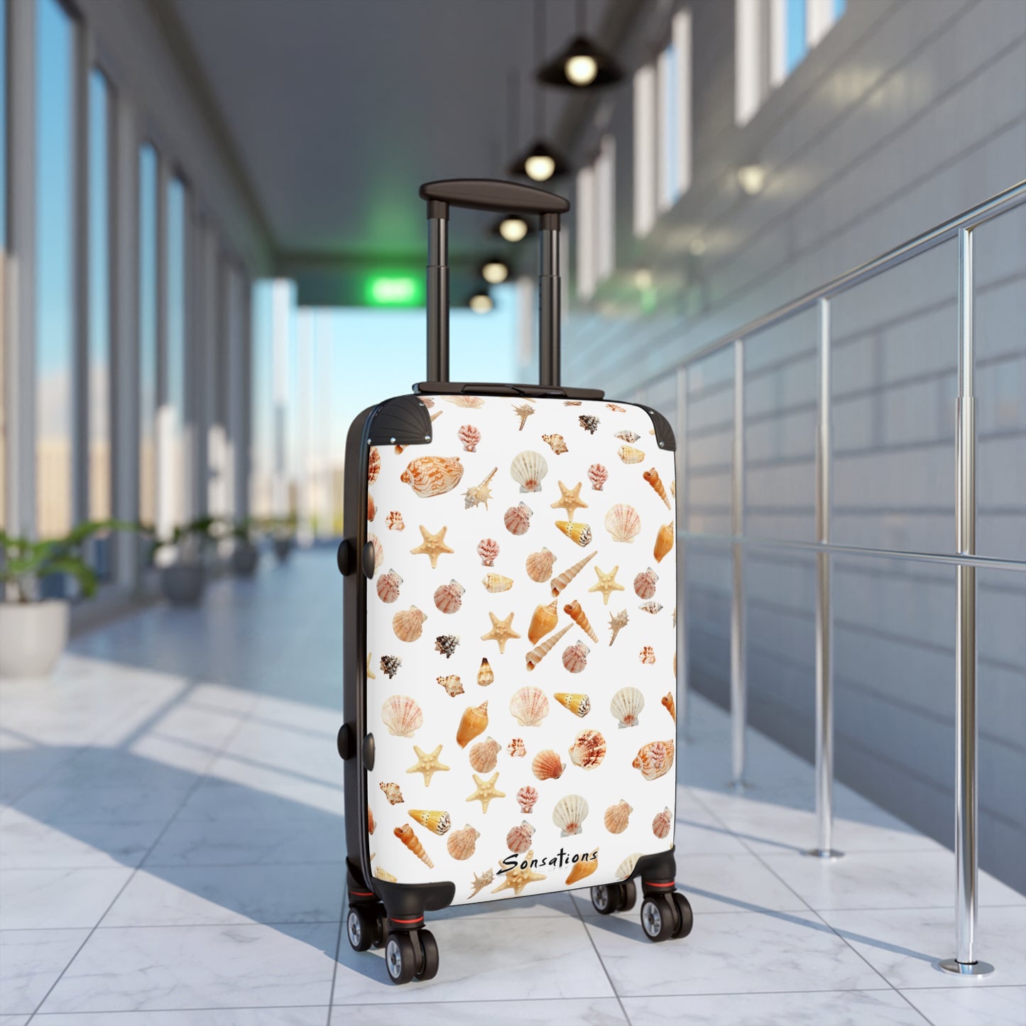 Stylish seashell pattern suitcase designed for travel with durable wheels and handle