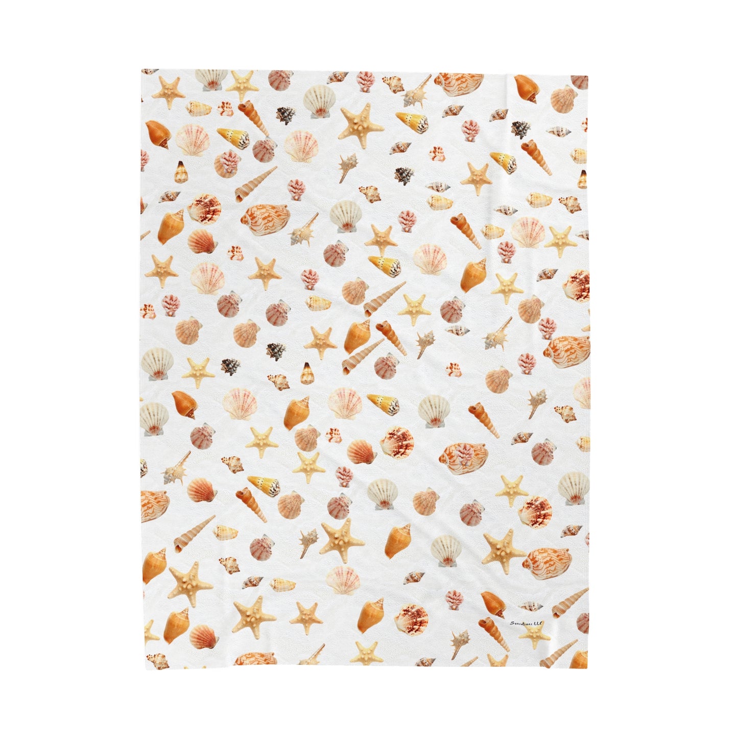 Sea shell velveteen blanket featuring a colorful pattern of seashells and starfish on a light background