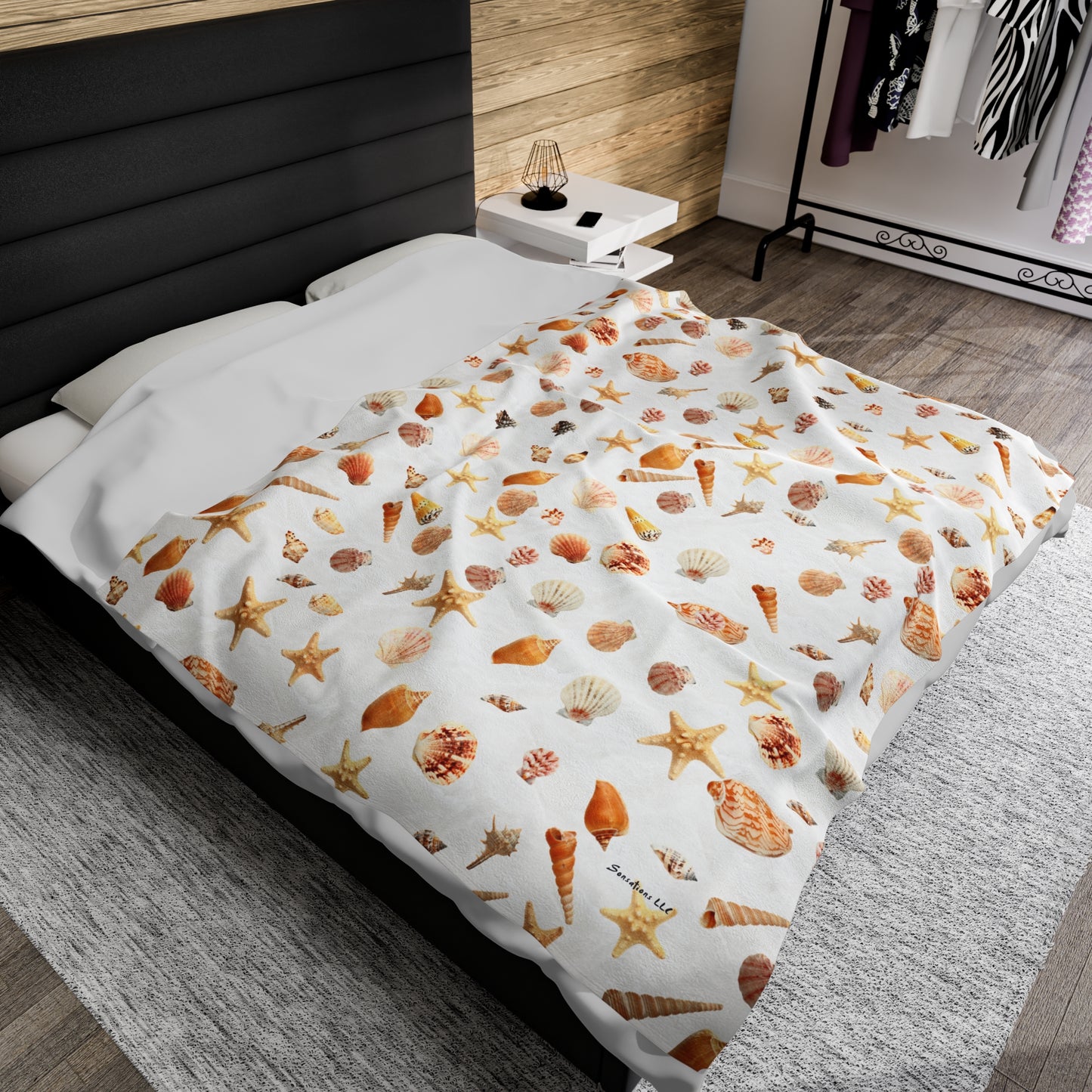 Sea shell velveteen blanket with colorful shell designs, perfect for cozy beach-themed decor