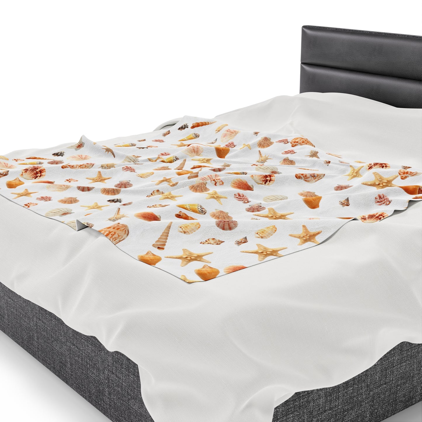 Sea shell velveteen blanket featuring colorful marine life designs on a soft fabric