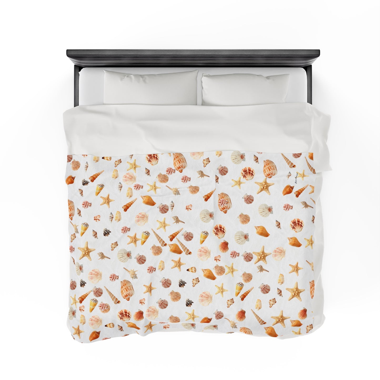 Sea shell velveteen blanket featuring a colorful all-over print of seashells and starfish on a white background