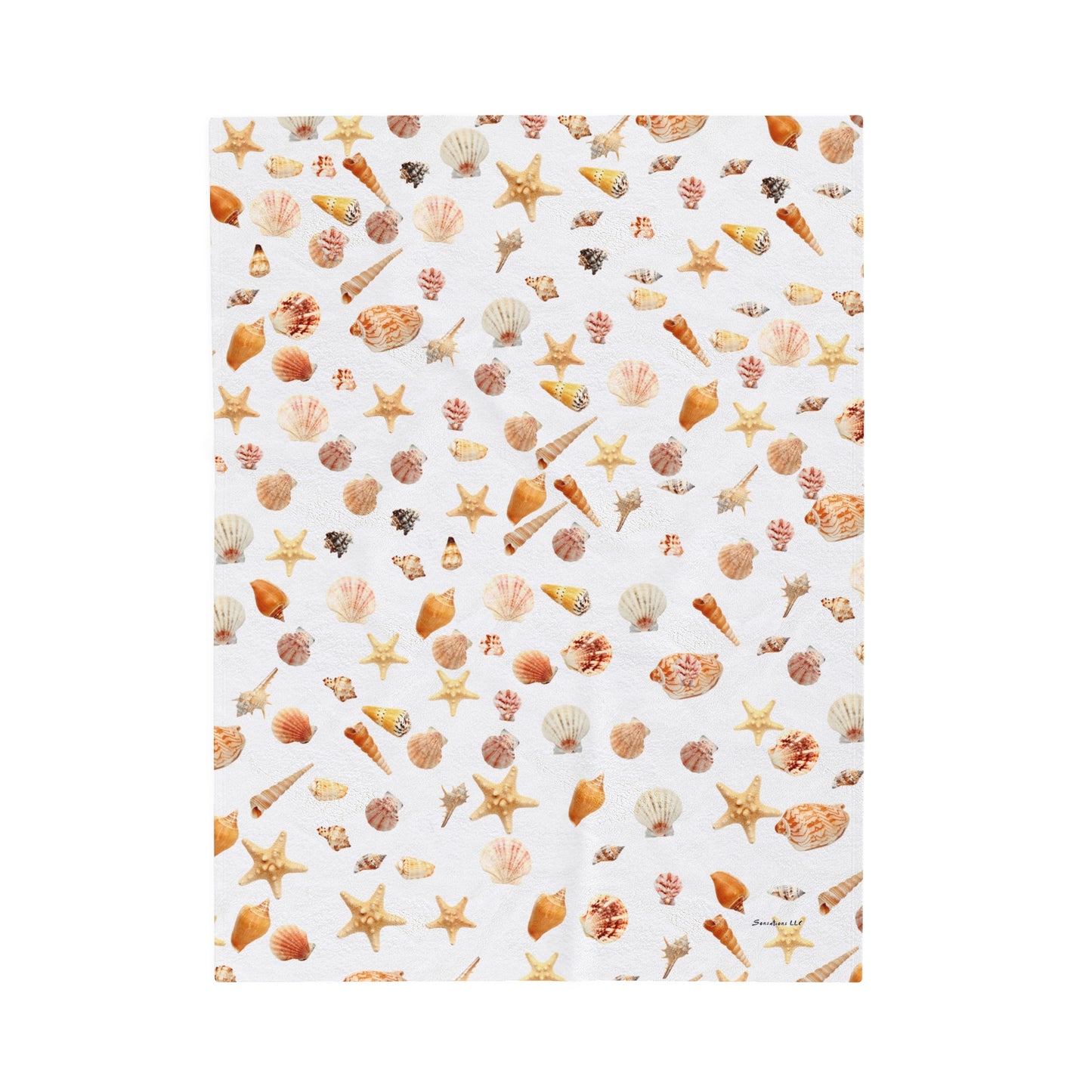 Sea shell velveteen blanket featuring a colorful pattern of seashells and starfish on a white background