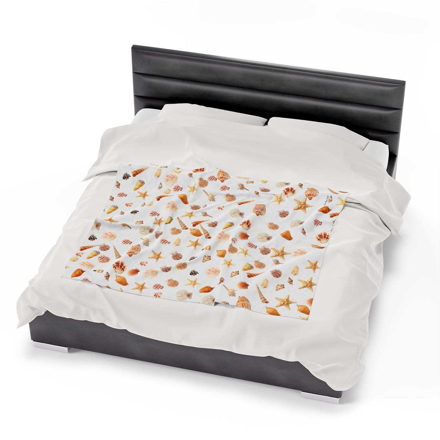 Sea shell velveteen blanket featuring various seashell designs for a coastal-inspired room decor