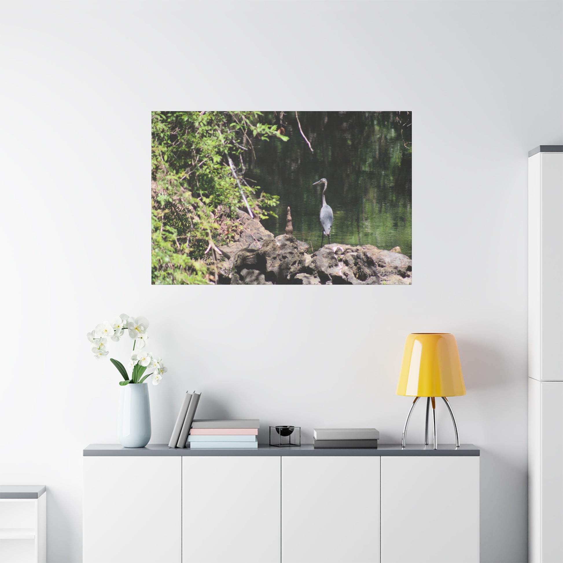 Anhinga bird canvas art featuring a serene water scene with lush greenery