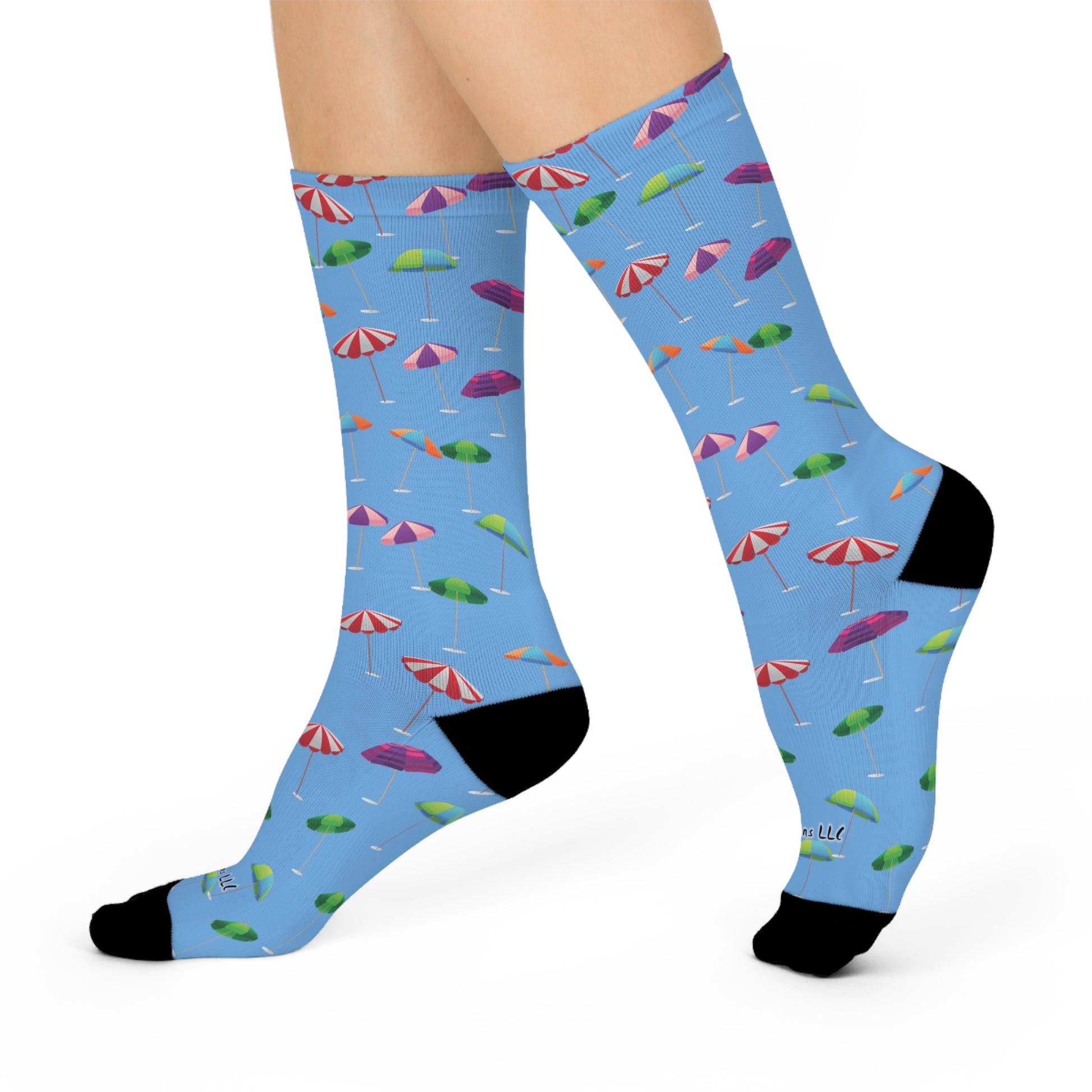 Fun and colorful crazy umbrella socks for sale with vibrant umbrella prints on a blue background