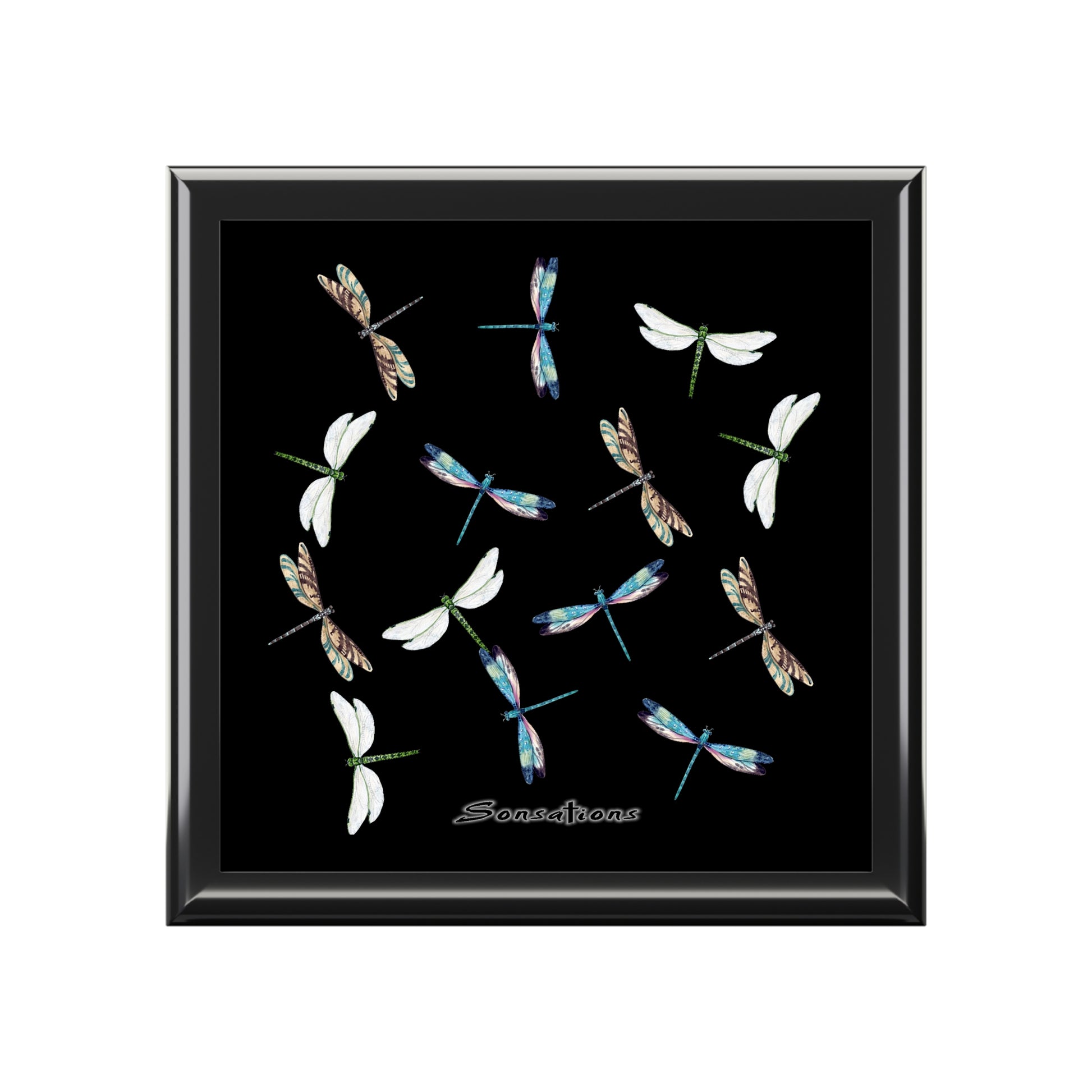 Decorative dragonfly jewelry box with vibrant designs on a black background