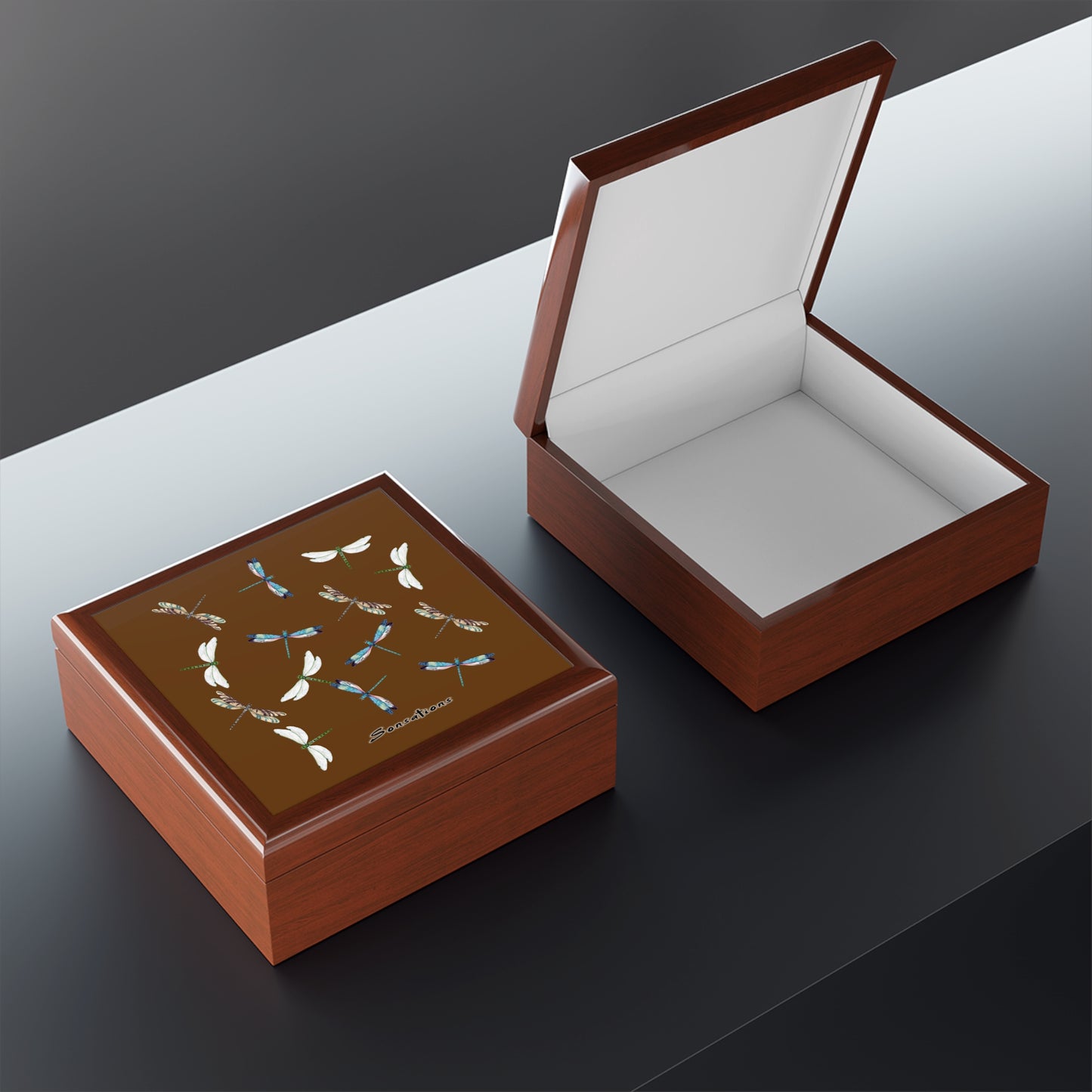 Elegant dragonfly jewelry box with a decorative lid and a spacious interior for storing accessories