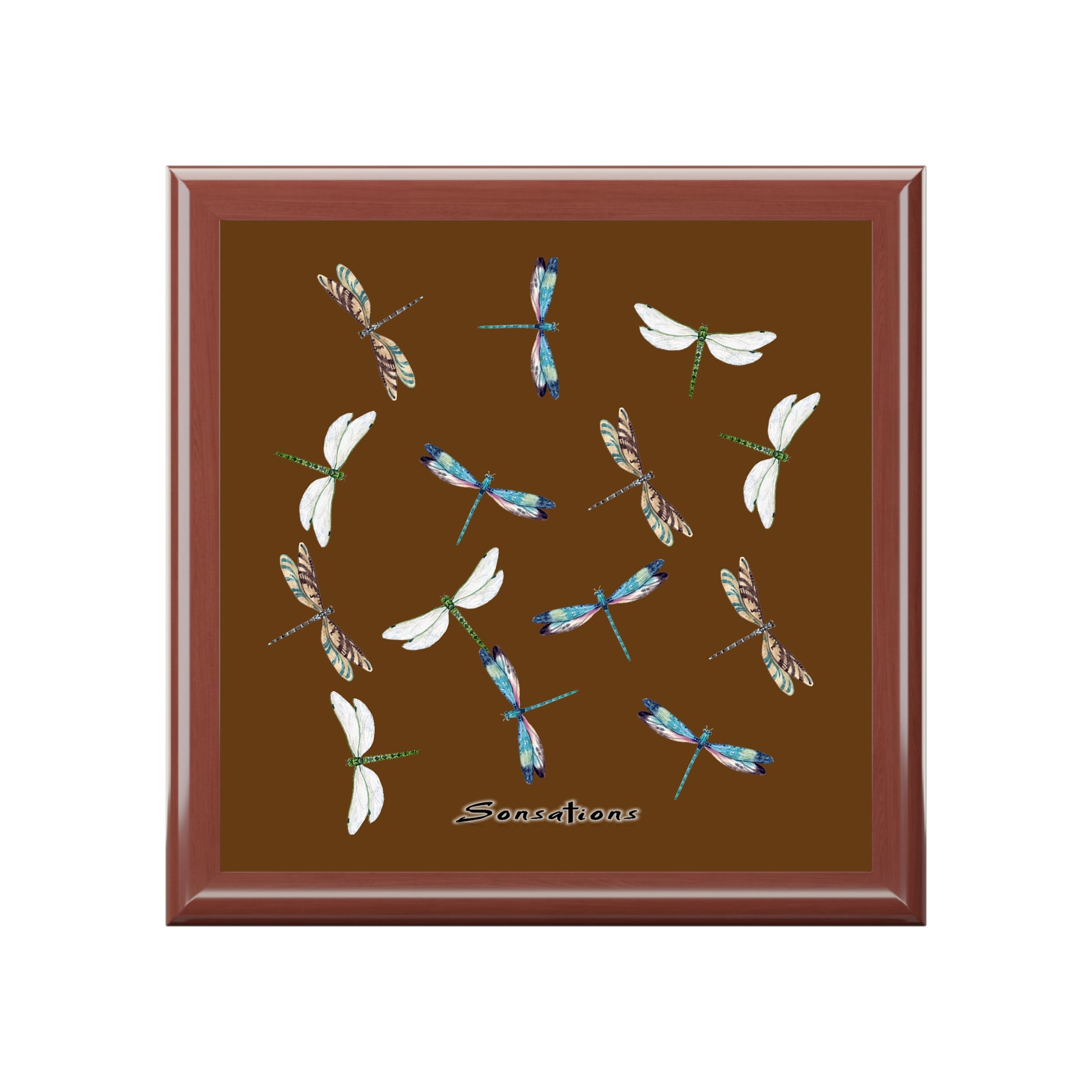 Decorative dragonfly jewelry box with intricate designs in blue and white on a brown background