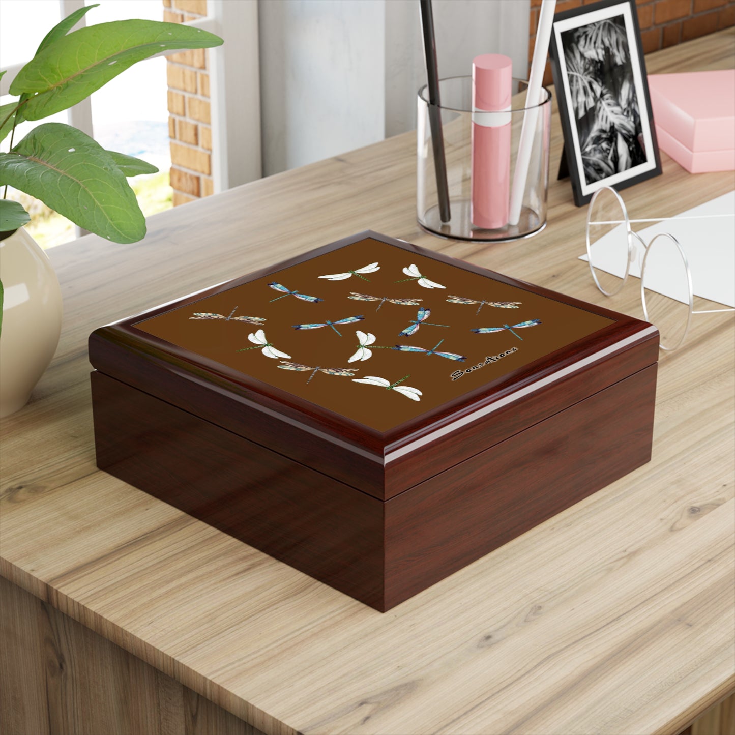 Stylish dragonfly jewelry box in a rich brown finish, perfect for organizing precious items
