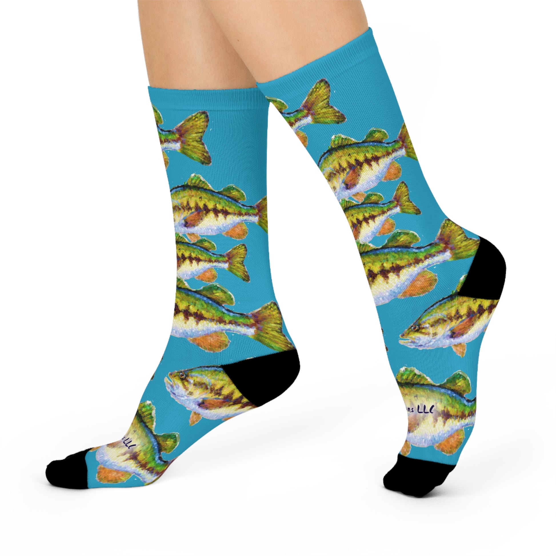 Colorful gift socks for anglers featuring vibrant fish patterns on a blue background