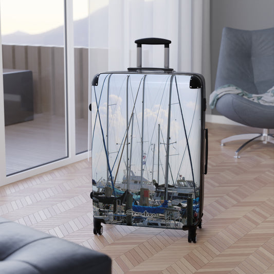 Nautical design suitcase travel luggage featuring a scenic marina view for stylish travelers