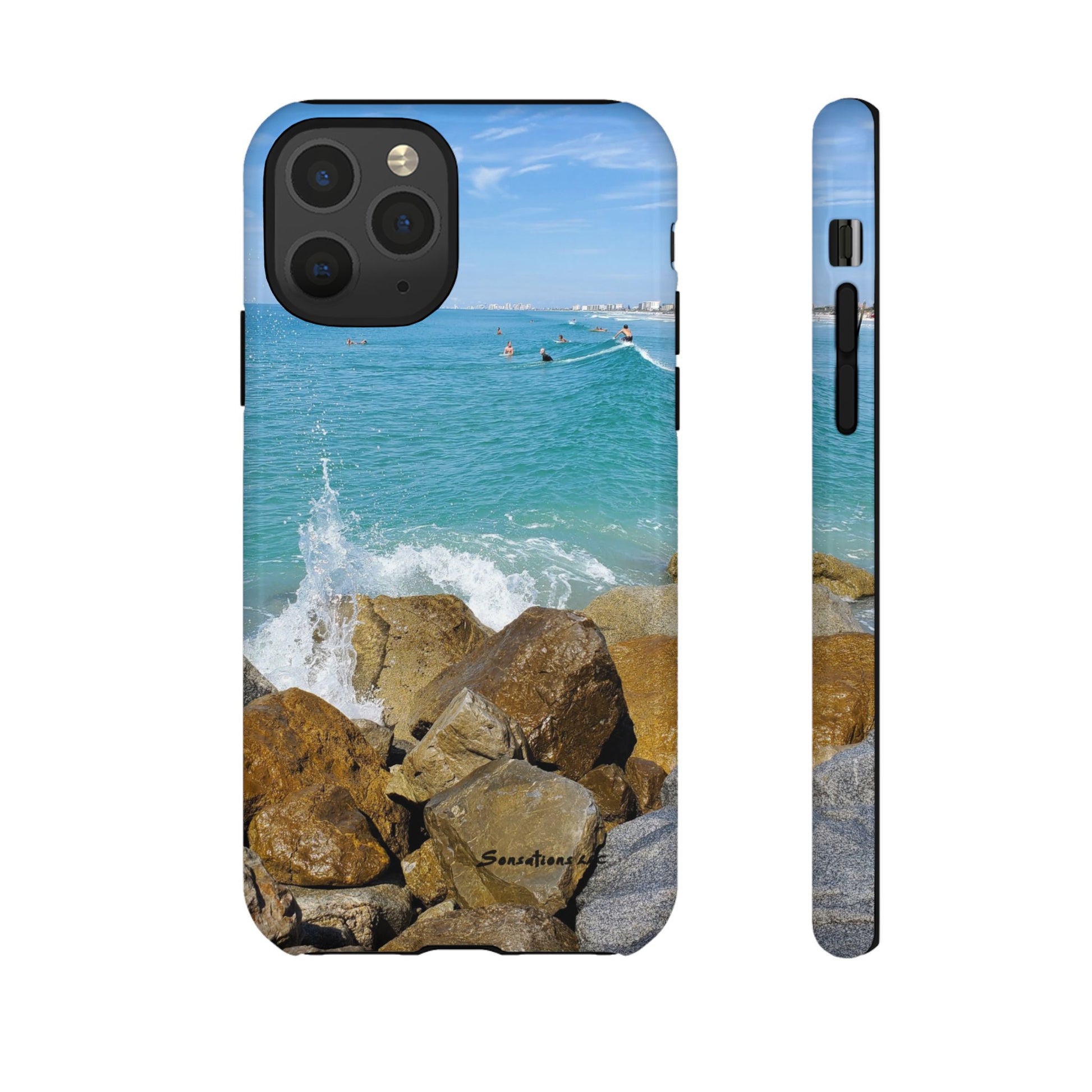 Surfer theme phone cover featuring a scenic beach view with rocks and turquoise water
