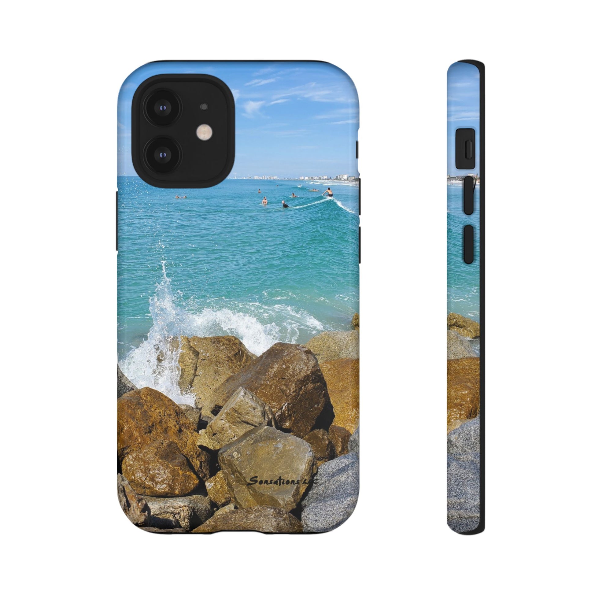 Surfer theme phone cover with a scenic beach view and crashing waves on rocky shore