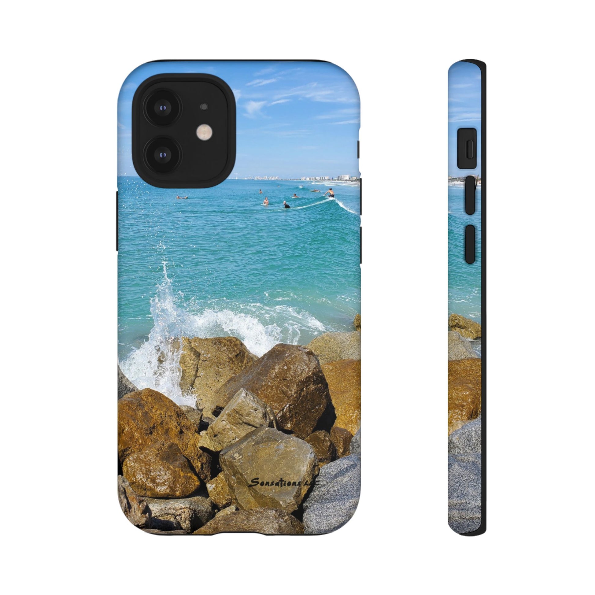 Surfer theme phone cover featuring a vibrant beach scene with waves and rocks