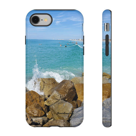 Surfer theme phone cover featuring a beach scene with waves and rocks for beach lovers