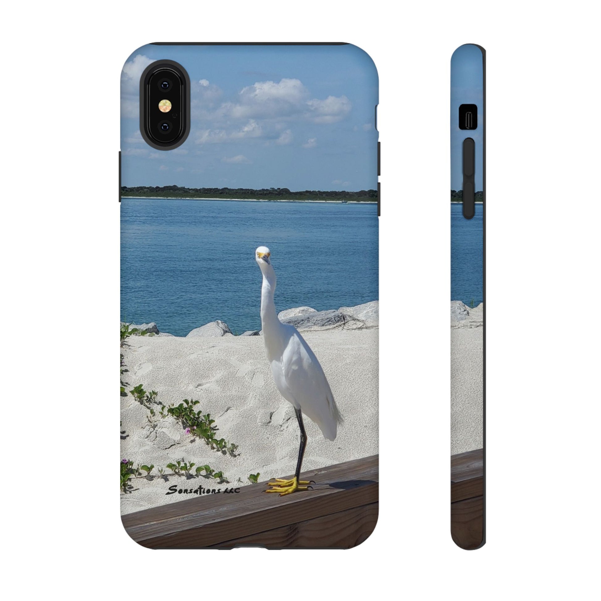 White bird phone case featuring an elegant heron by a serene blue water background