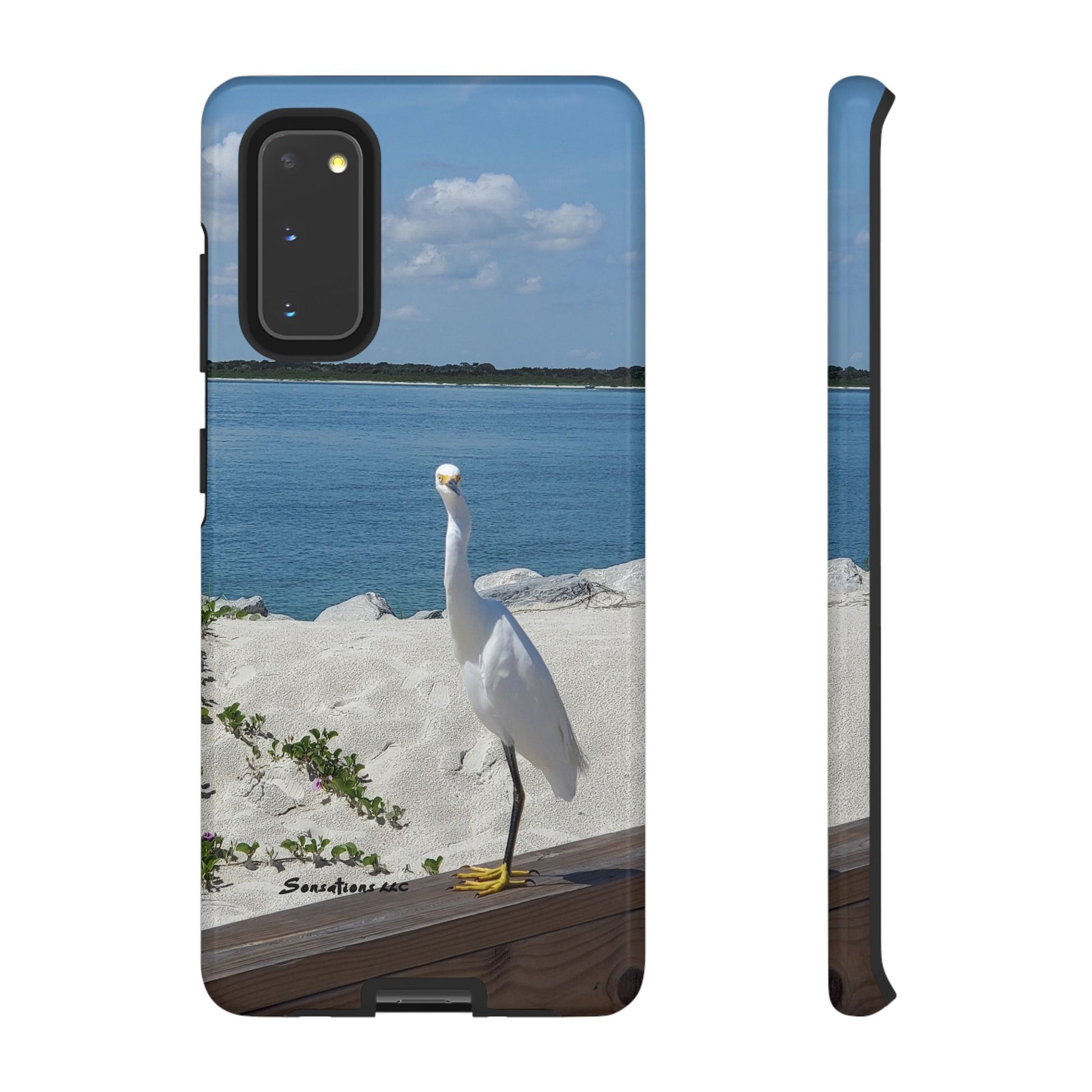 White bird phone case featuring an elegant egret by the beach with a scenic view
