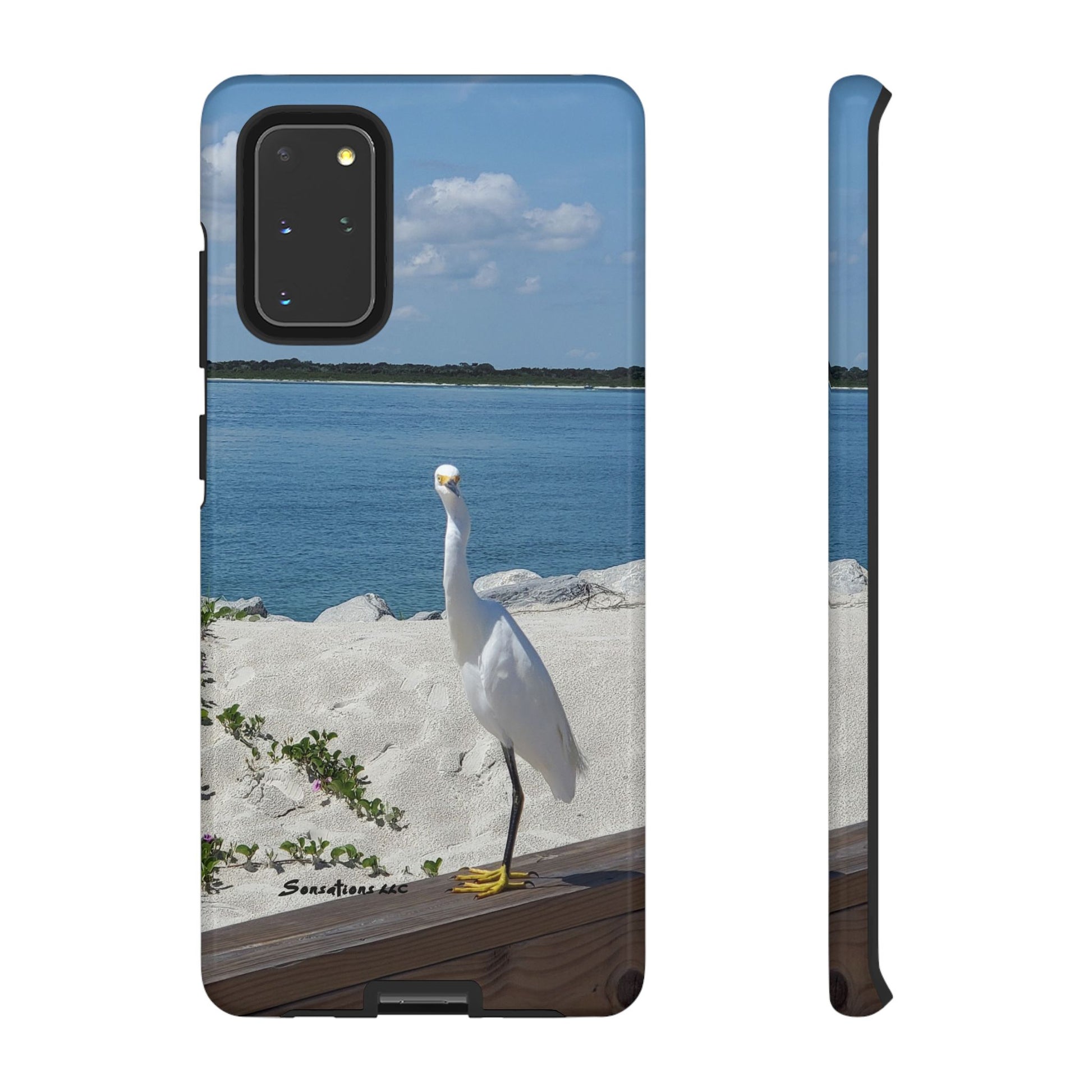 White bird phone case featuring a scenic view of a bird by the water on a sunny day