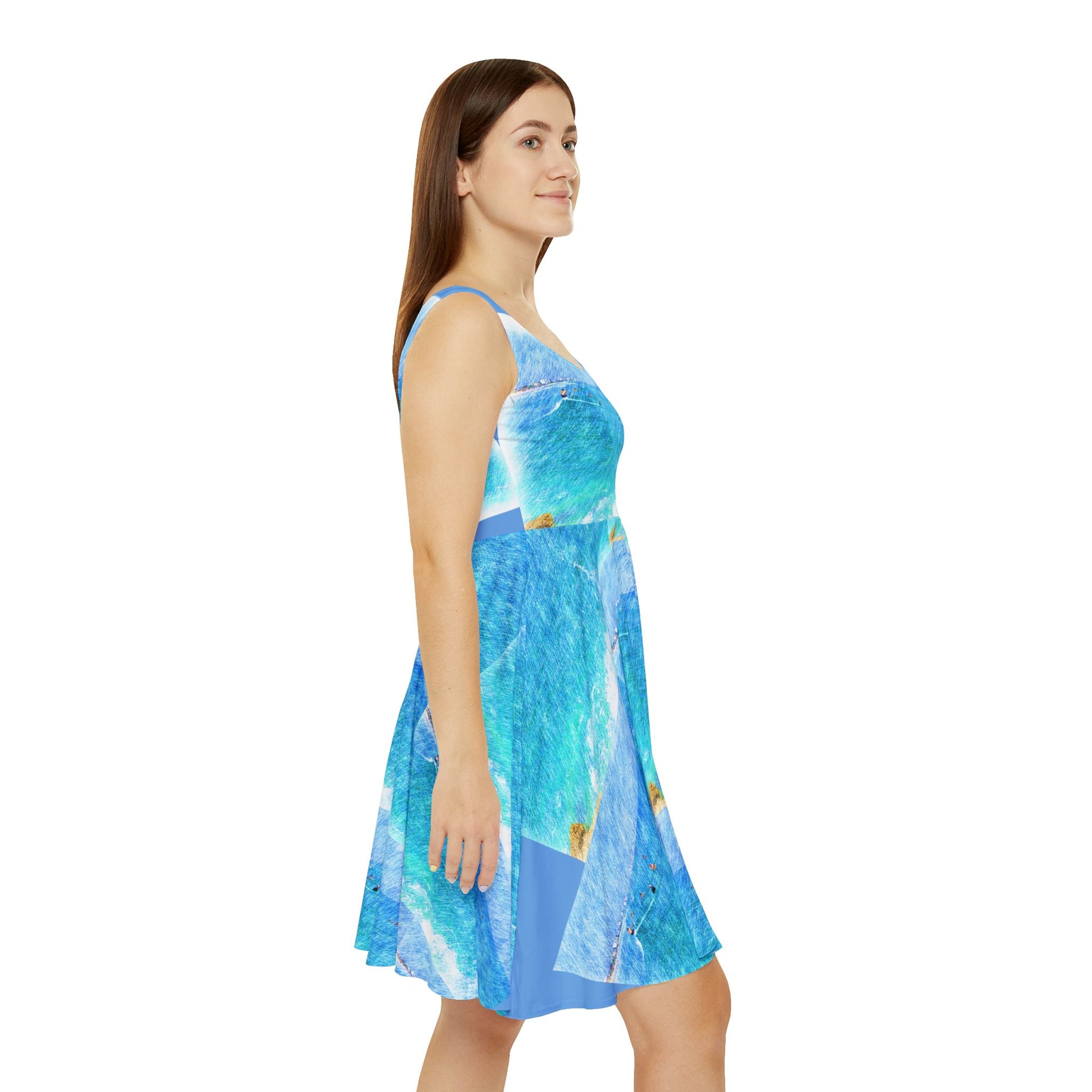 Side view of a surf inspired women's dress with a vibrant ocean print for beach lovers