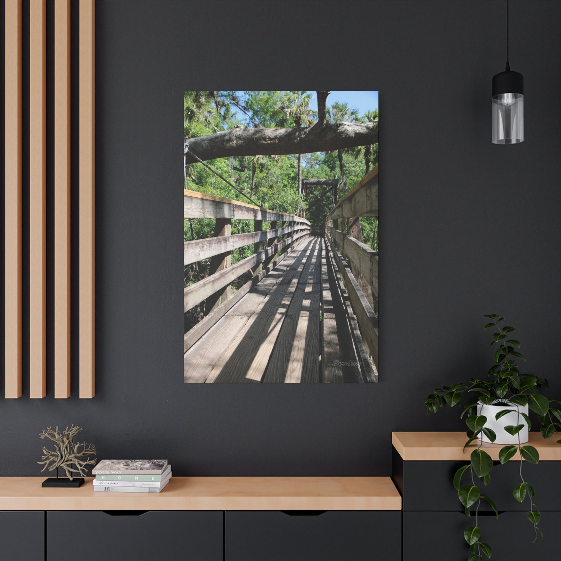 Tranquil bridge nature wall art featuring a wooden bridge surrounded by greenery
