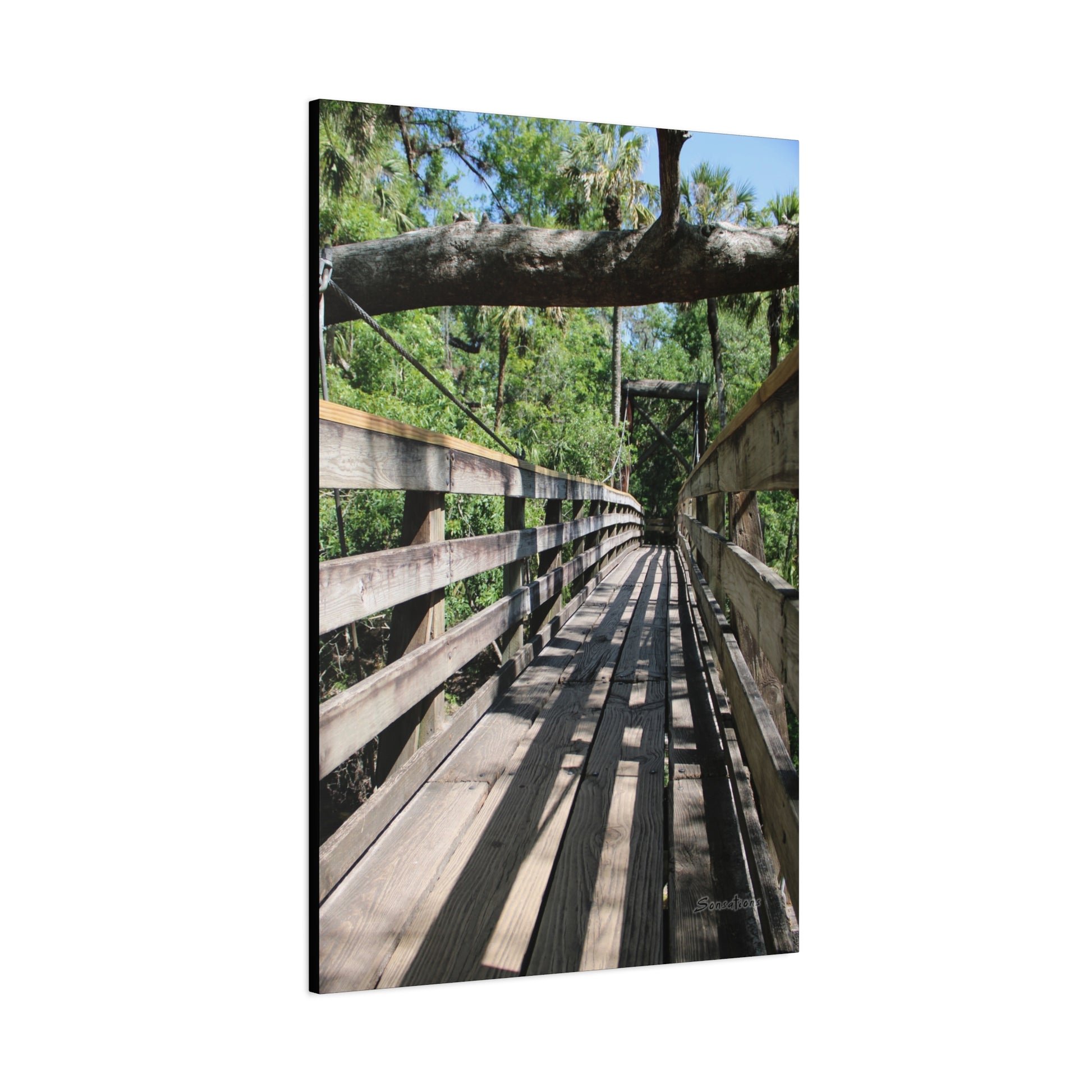 Tranquil bridge nature wall art featuring a wooden bridge surrounded by lush greenery