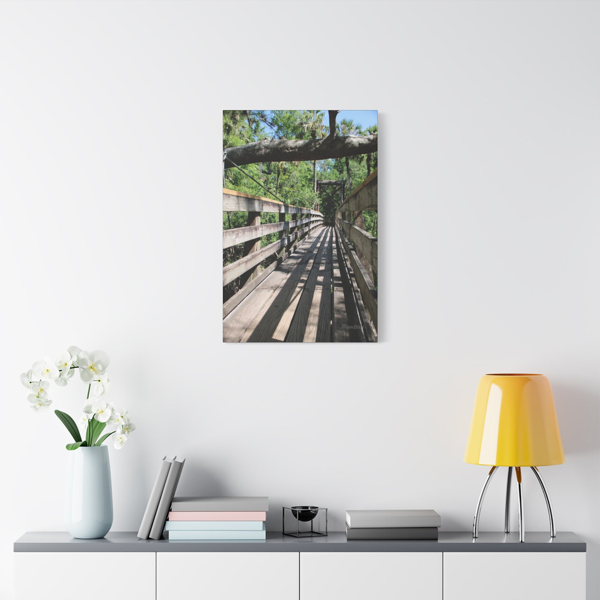 Tranquil bridge nature wall art featuring a serene wooden walkway surrounded by lush greenery