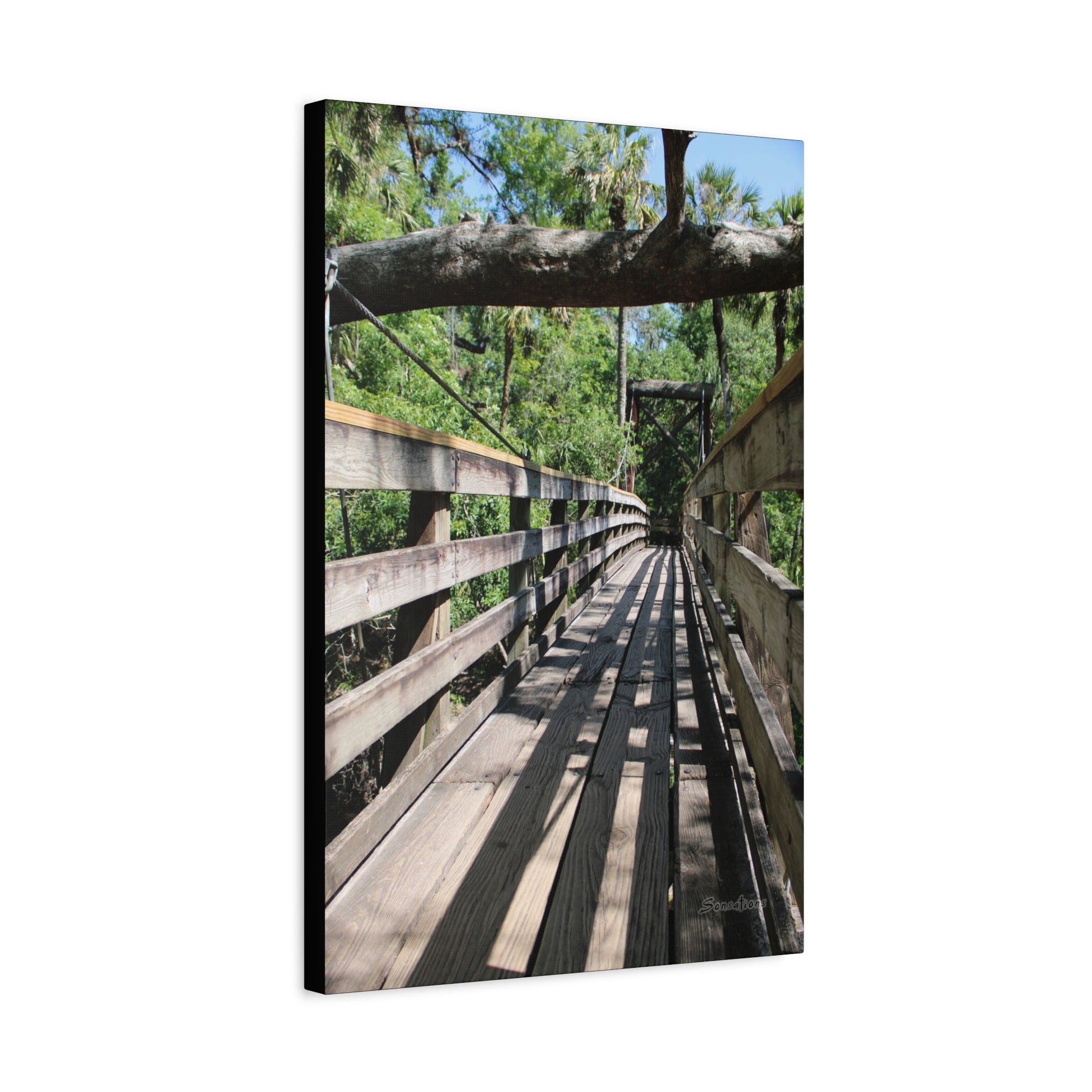 Tranquil bridge nature wall art showcasing a serene wooden walkway surrounded by lush greenery